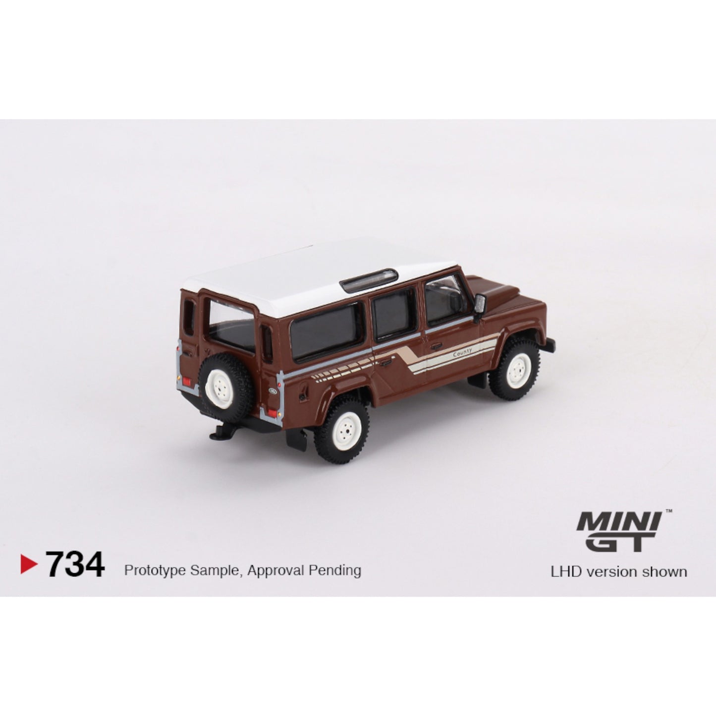 Mini GT - Land Rover Defender 110 1985 County Station Wagon Russet Brown - MGT00734 (LHD) - 1:64