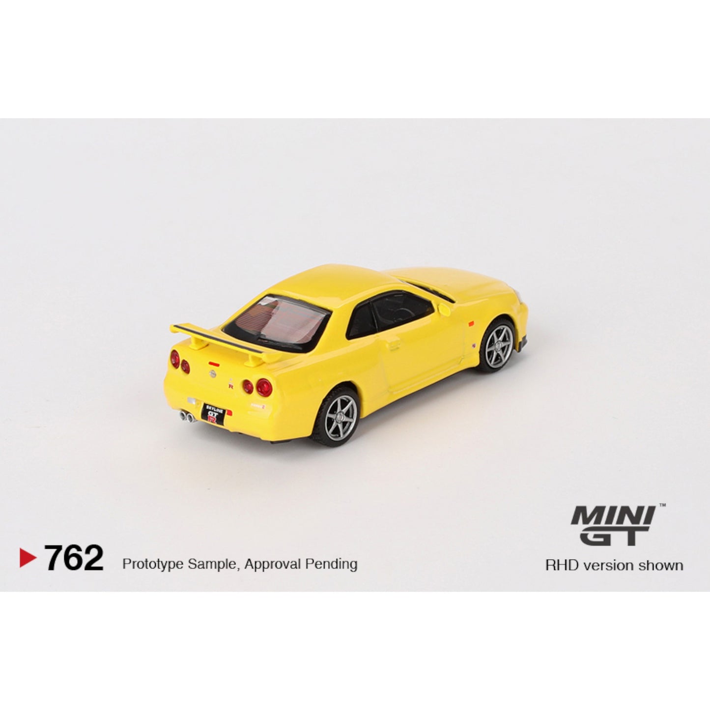 Mini GT - Nissan Skyline GT-R (R34) V-Spec Lightning Yellow - MGT00762 (RHD) - 1:64