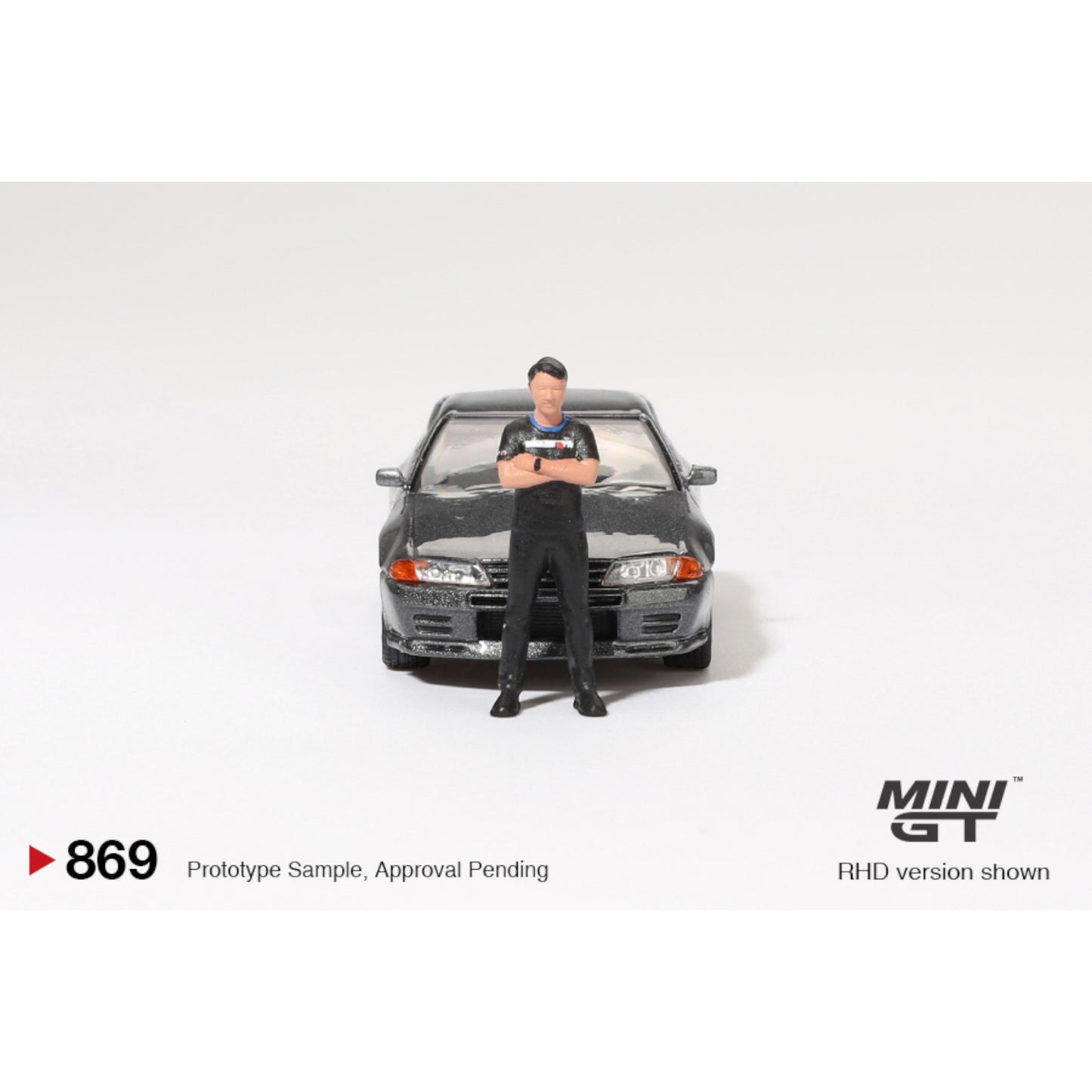 Mini GT - Nissan Skyline GT-R (R32) Nismo Gunmetal W/ Matsuda Figure - MGT00869 (RHD)