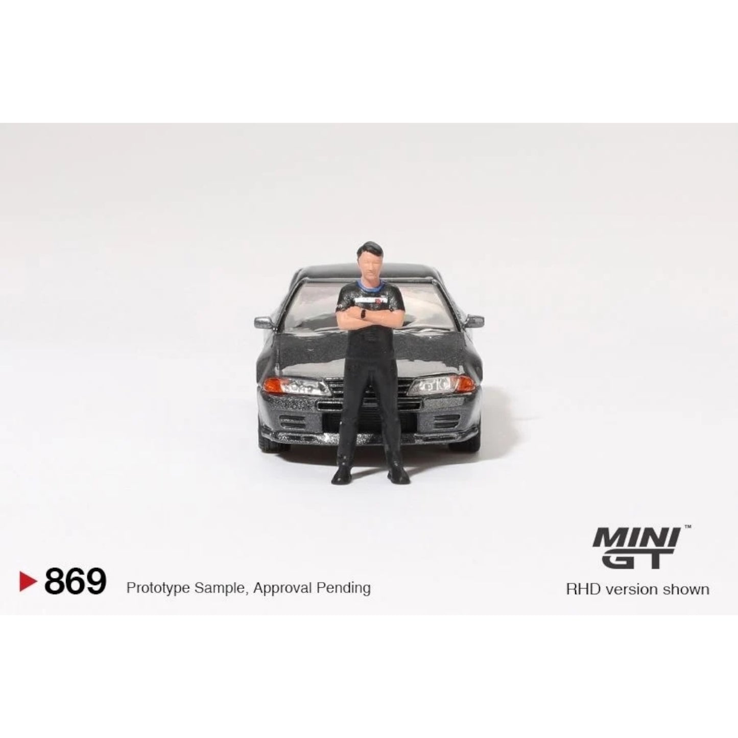 Mini GT - Pre-Order - Nissan Skyline GT-R (R32) Nismo Gunmetal W/ Matsuda Figure - MGT00869 (RHD)