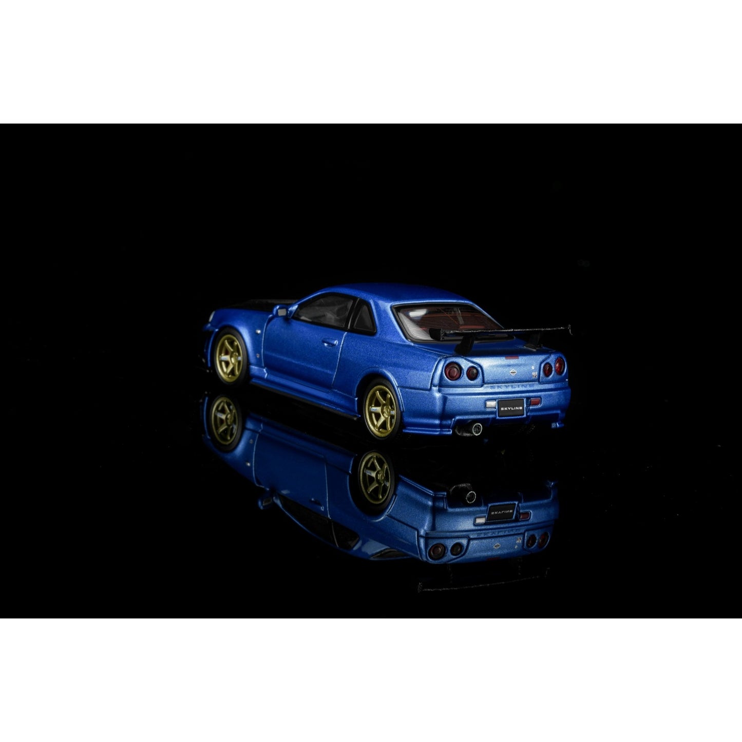 Motorhelix - Pre-Order - Nissan Skyline GT-R (R34) Customized with GT Aero Kit, bayside blue - M63476