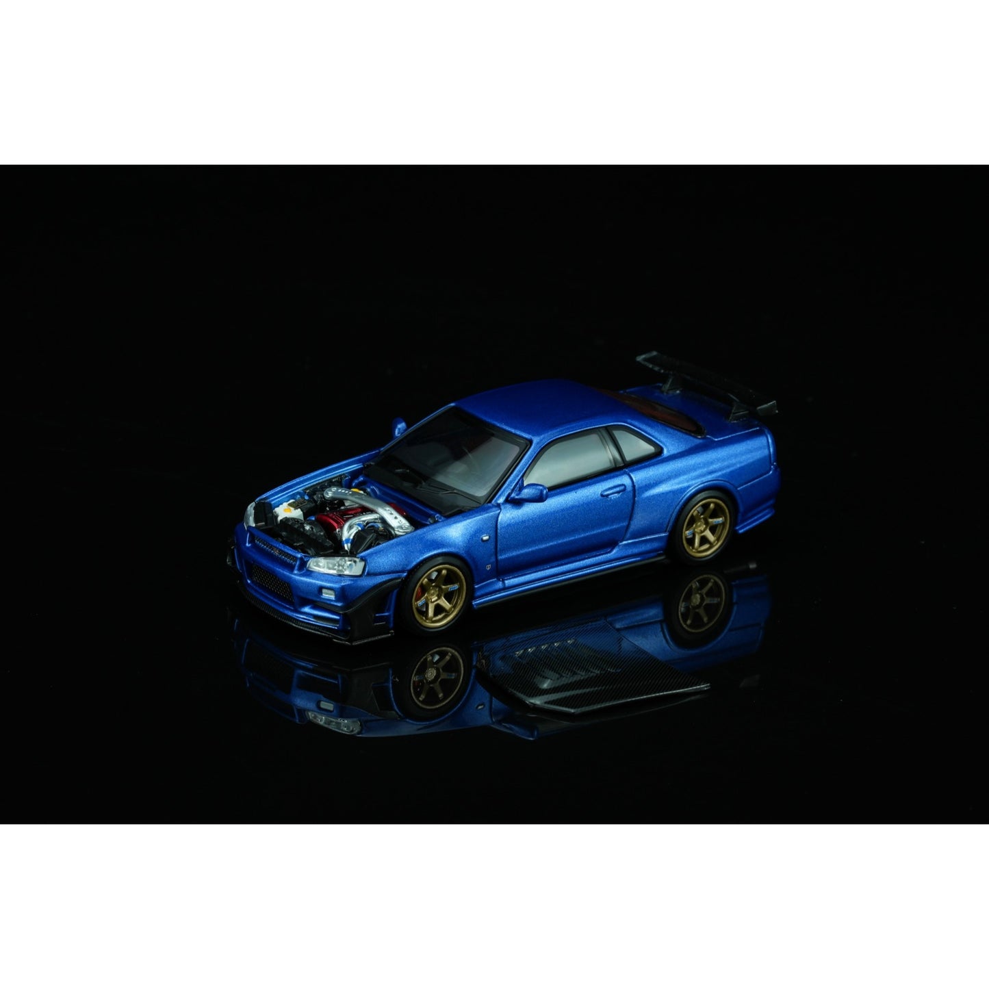 Motorhelix - Pre-Order - Nissan Skyline GT-R (R34) Customized with GT Aero Kit, bayside blue - M63476