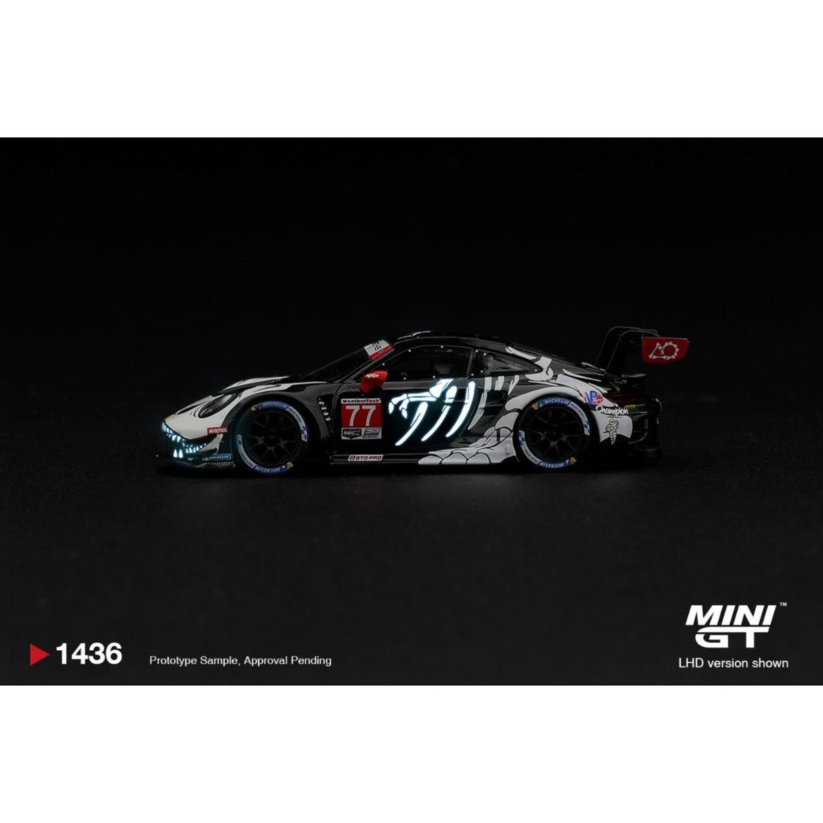 Mini GT - Pre-Order - Porsche 911 GT3 R (992) #77 AO Racing "Skeleton Rexy" 2026 IMSA Petit Le Mans - MGT01436 (LHD)
