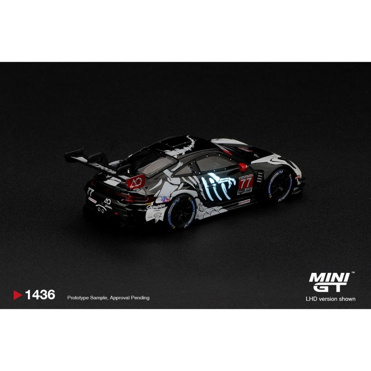 Mini GT - Pre-Order - Porsche 911 GT3 R (992) #77 AO Racing "Skeleton Rexy" 2026 IMSA Petit Le Mans - MGT01436 (LHD)