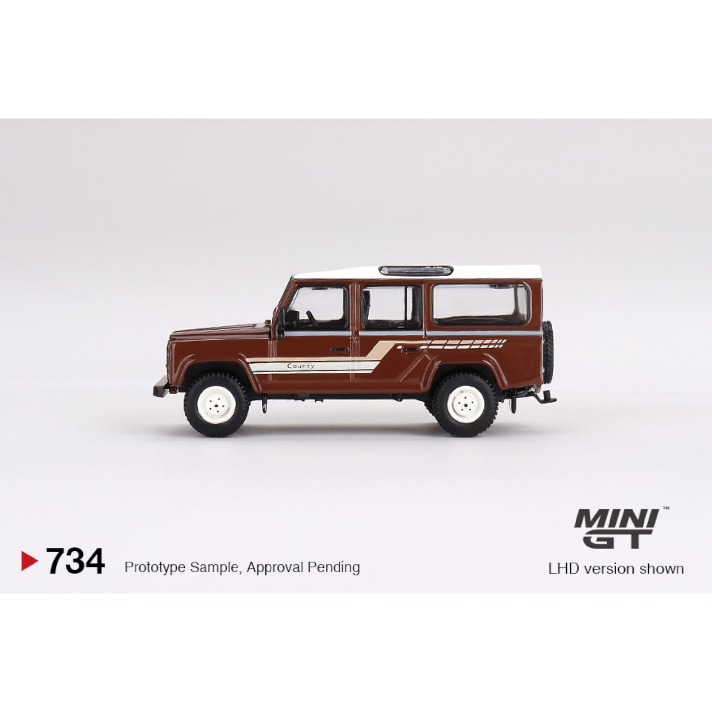 Mini GT - Land Rover Defender 110 1985 County Station Wagon Russet Brown - MGT00734 (LHD) - 1:64