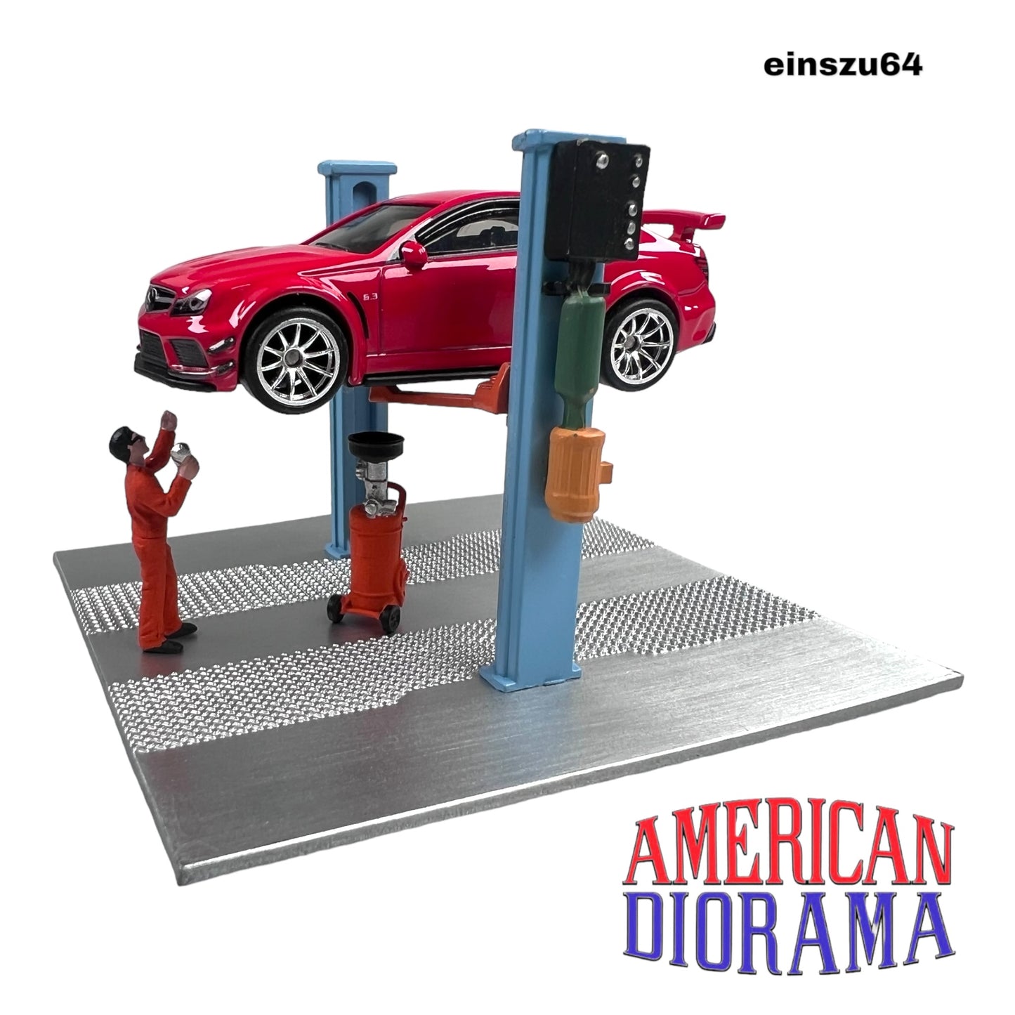 American Diorama -  2 Post Lift with Oil Drainer & Mechanic Figure - AD-38379MJ - 1:64